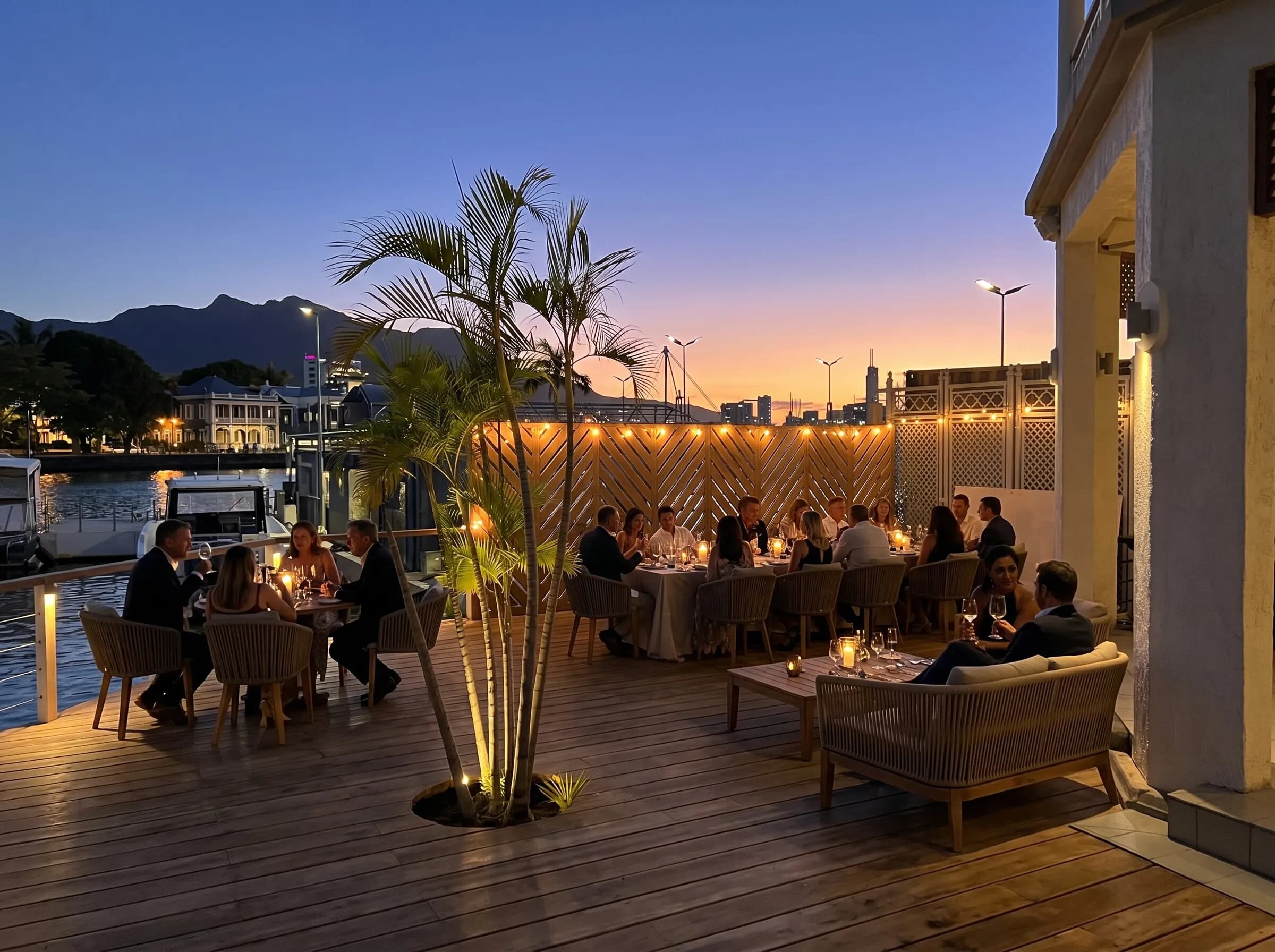 A marina-side gathering at Secrets in the golden evening light